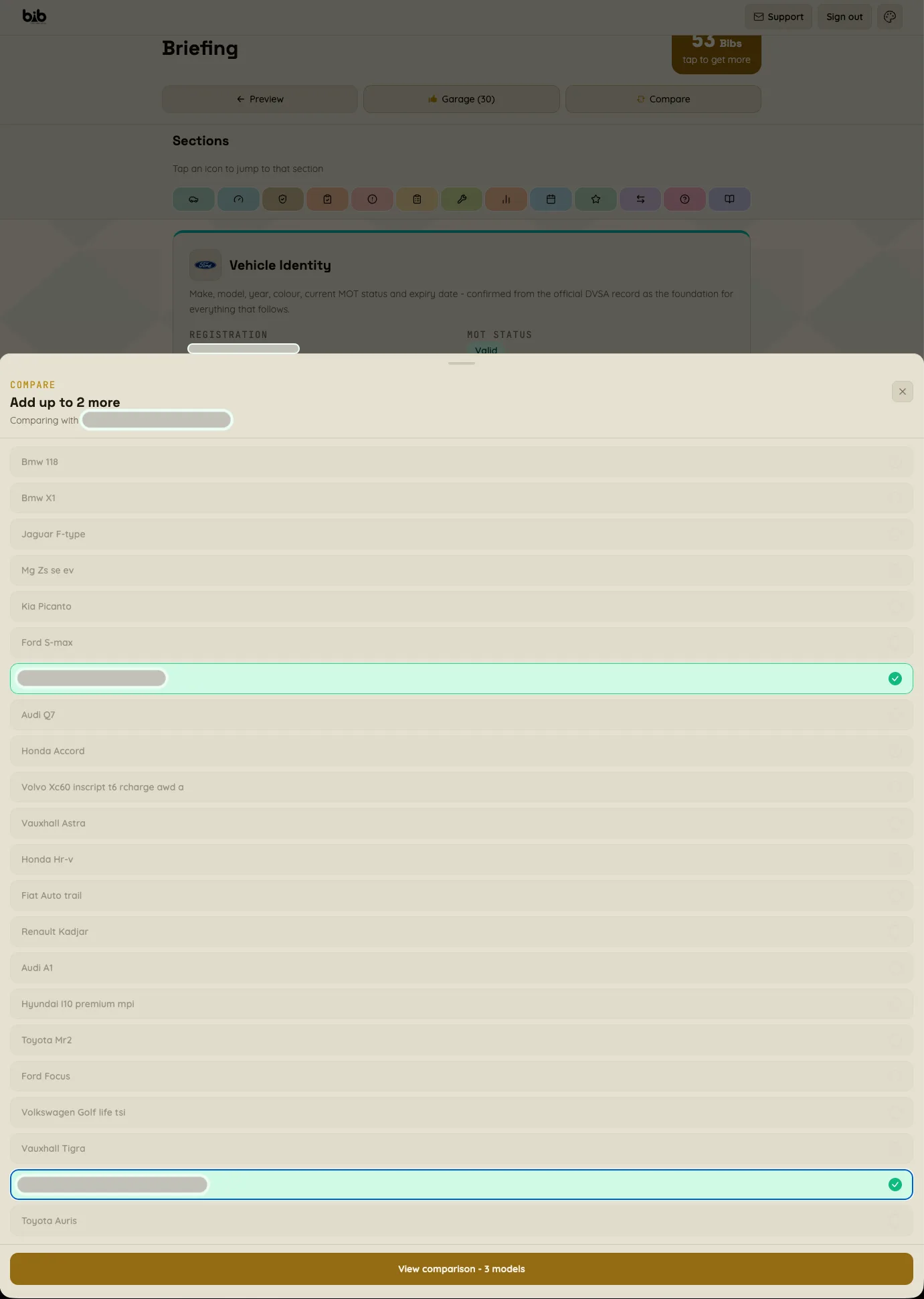 The Compare selector showing previously researched models as a scrollable list